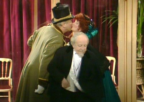 Benny gives Lorraine Doyle a kiss while Len Keyes isn't looking!