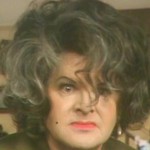 Benny as Elizabeth Taylor in Who's Afraid of Virginia Wool from 'Humphrey Bumphrey: Continuity Announcer'