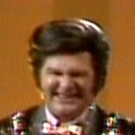Benny as Liberace in one of the Bloopers