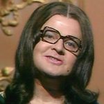 Benny as Nana Mouskouri in Benny's All-Star Finale