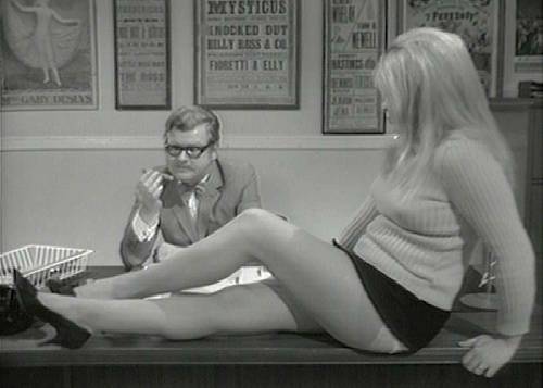Sue Bond shows off her legs in Benny Quickies: The Unexpected Look